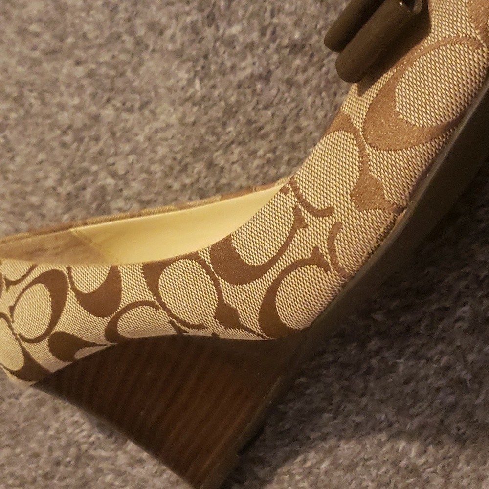 Coach wedge shoes.